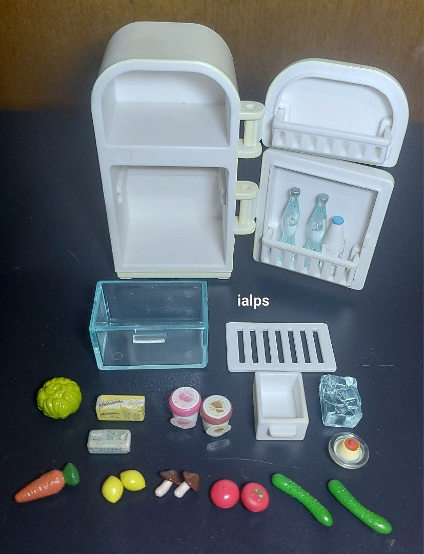 Sylvanian Families Mother Chocolate Rabbit with Refrigerator Set and Mini Foodies (Category: Designer & Blind Box Toys) located in Pasig City. Submitted by lpsflover (Listing ID 1314484839, Image 3). Description: No signs of cracks nor paint rubs. Almost new. No scratches. Figure is used. Refrigerator and the mini items look brand new. No box. Not played with. Figure is included. Payment via BPI/BDO/Gcash. Shipping via Lalamove..
