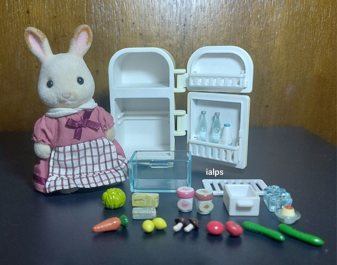 Sylvanian Families Mother Chocolate Rabbit with Refrigerator Set and Mini Foodies (Category: Designer & Blind Box Toys) located in Pasig City. Submitted by lpsflover (Listing ID 1314484839, Image 1). Description: No signs of cracks nor paint rubs. Almost new. No scratches. Figure is used. Refrigerator and the mini items look brand new. No box. Not played with. Figure is included. Payment via BPI/BDO/Gcash. Shipping via Lalamove..