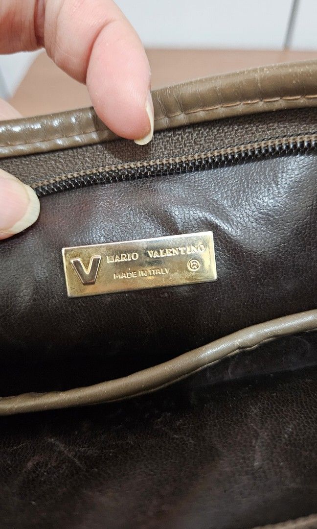 Valentino pouch (Category: Luxury Bags & Wallets) located in Pasig City. Submitted by luxefab.finds (Listing ID 1314440737, Image 3). Description: Mario Valentino pouch Feel free to message me for offers 😀 Rfs: decluttering; too many bags and wallets.