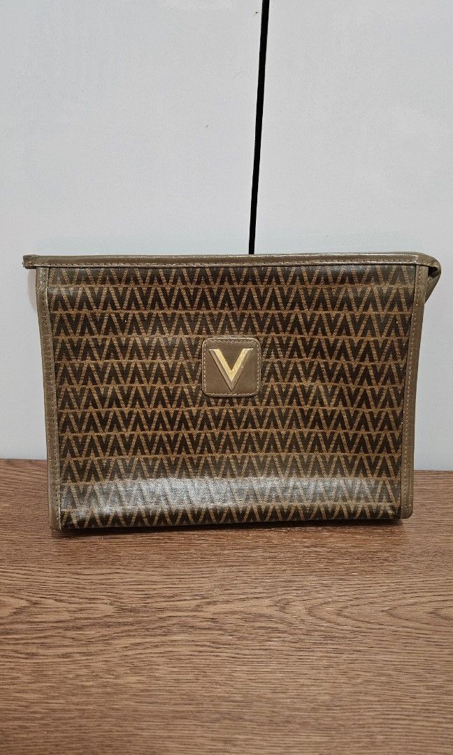 Valentino pouch (Category: Luxury Bags & Wallets) located in Pasig City. Submitted by luxefab.finds (Listing ID 1314440737, Image 1). Description: Mario Valentino pouch Feel free to message me for offers 😀 Rfs: decluttering; too many bags and wallets.