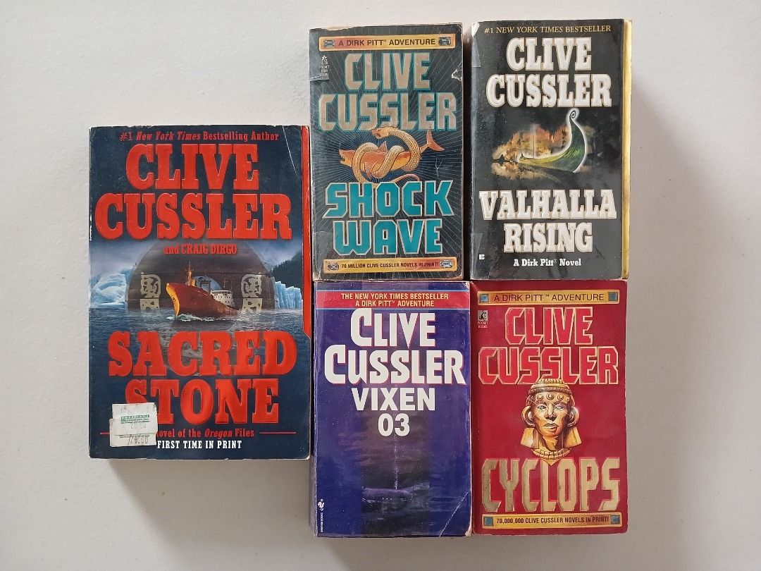 Clive Cussler books, paperback novels (Category: Storybooks) located in Paranaque City. Submitted by jillian.ic (Listing ID 1314584993, Image 1). Description: Clive Cussler books (5 titles) Sacred Stone Shock Wave Valhalla Rising Vixen 03 Cyclops Php20 each (non-negotiable) Paperback novels, some with plastic cover FULL DISCLOSURE: While still fully readable, all books for sale have been in storage for years. Along with page foxing and yellowing,