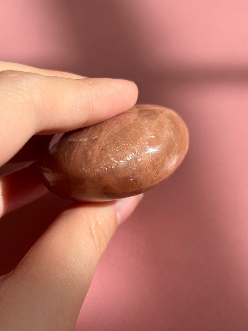 Crystals: Peach Moonstone Palm Stone (Category: Other Home Decor) located in Las Pinas. Submitted by cc.declutter (Listing ID 1314720839, Image 3). Description: up for sale peach moonstone palm stone php 300, negotiable 2 x 4.2 x 4.5 cm pay 50% within 24 hours, then settle remaining balance in 3 days max location: las piñas mop: bpi, maya, gcash mod: same-day delivery, j&t, gogoxpress.