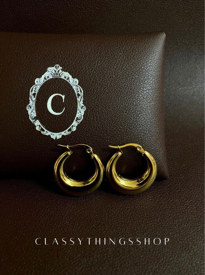 Gold Earrings Bundle of Four (Category: Earrings) located in Quezon City. Submitted by classythingsshop (Listing ID 1314485235, Image 2). Description: Gold Earrings Bundle of Four. Earrings Individual Prices • Chunky Gold Hoops: ₱750 • Croissant Hoops: ₱750 • Bamboo Hoops: ₱700 • Teardrop Earrings: ₱850 Total = ₱3,050 Bundle Price = ₱2,500 Actual photo of the items. Material: Stainless steel. All our items are high quality, nontarnish and hypoall