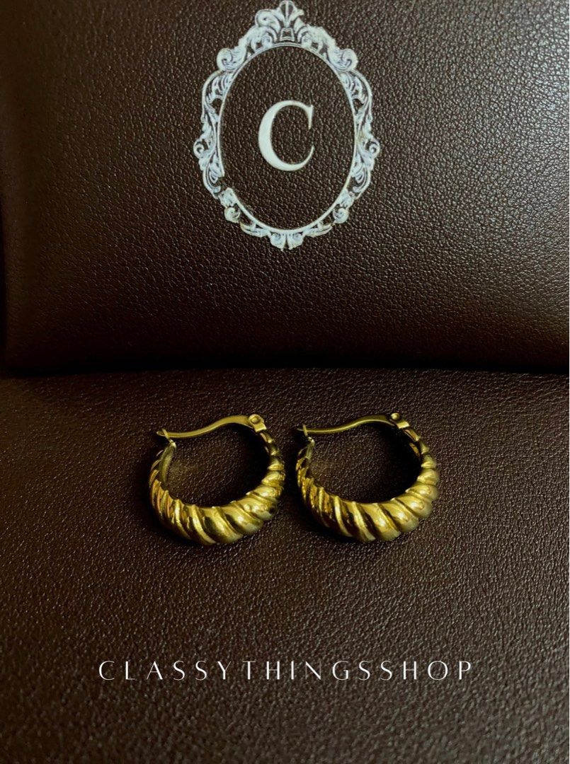 Gold Earrings Bundle of Four (Category: Earrings) located in Quezon City. Submitted by classythingsshop (Listing ID 1314485235, Image 3). Description: Gold Earrings Bundle of Four. Earrings Individual Prices • Chunky Gold Hoops: ₱750 • Croissant Hoops: ₱750 • Bamboo Hoops: ₱700 • Teardrop Earrings: ₱850 Total = ₱3,050 Bundle Price = ₱2,500 Actual photo of the items. Material: Stainless steel. All our items are high quality, nontarnish and hypoall