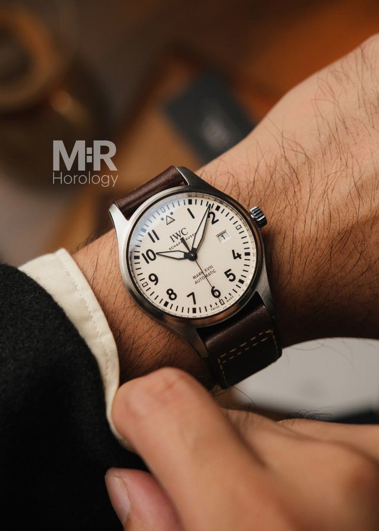IWC PILOT MK18 REF 327012 (Category: Luxury Watches) located in San Juan City. Submitted by horologymr (Listing ID 1314585574, Image 1). Description: IWC PILOT MK18 reference 327012 Year 2020 White dial 40mm case diameter Stainless steel Original leather strap Automatic cal 35111 42hours power reserve Sapphire glass 9/10 condition Complete set P220k IG@HorologyMR Trades accepted/ negotiable Shipping available ✅ All photos are actual photos of the