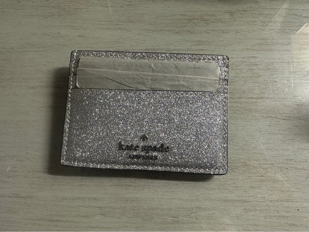 Kate Spade card holder (AUTHENTIC) (Category: Wallets & Card holders) located in Pasay City. Submitted by mpreloved57 (Listing ID 1314561943, Image 2). Description: .