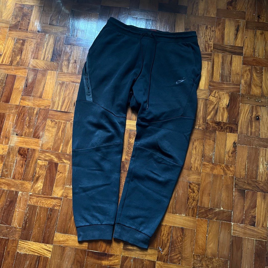 Nike Techfleece Pants (Category: Joggers) located in Paranaque City. Submitted by declutteringstuff (Listing ID 1314729364, Image 1). Description: 30-34 waist 37 length XL on tag 8/10 condition small repairable pinhole at the back if black brip mo di halata HHHAHAHAH shipping from paranaque! .