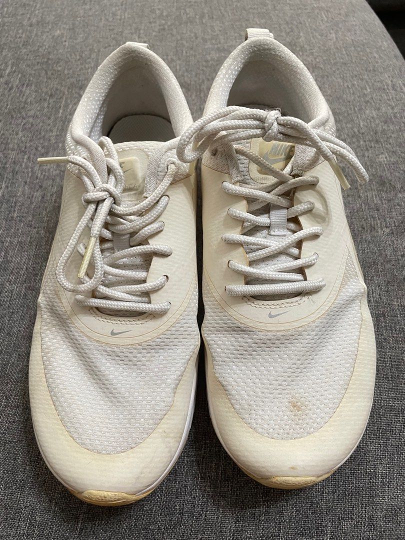 Nike Women White Sneakers (Category: Sneakers) located in Manila. Submitted by preloved0805 (Listing ID 1314656354, Image 3). Description: Bought in kids section. Can fit size 6-6.5, 24cm Flaw: has became yellowish after storage.