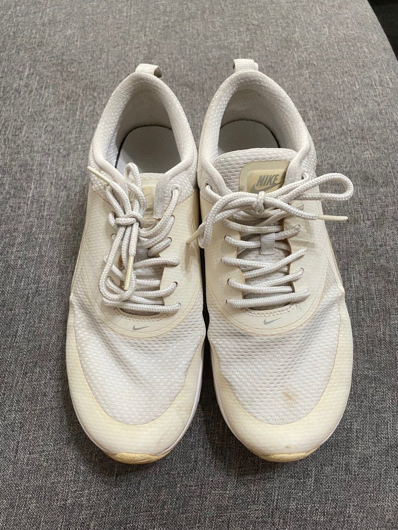 Nike Women White Sneakers (Category: Sneakers) located in Manila. Submitted by preloved0805 (Listing ID 1314656354, Image 1). Description: Bought in kids section. Can fit size 6-6.5, 24cm Flaw: has became yellowish after storage.