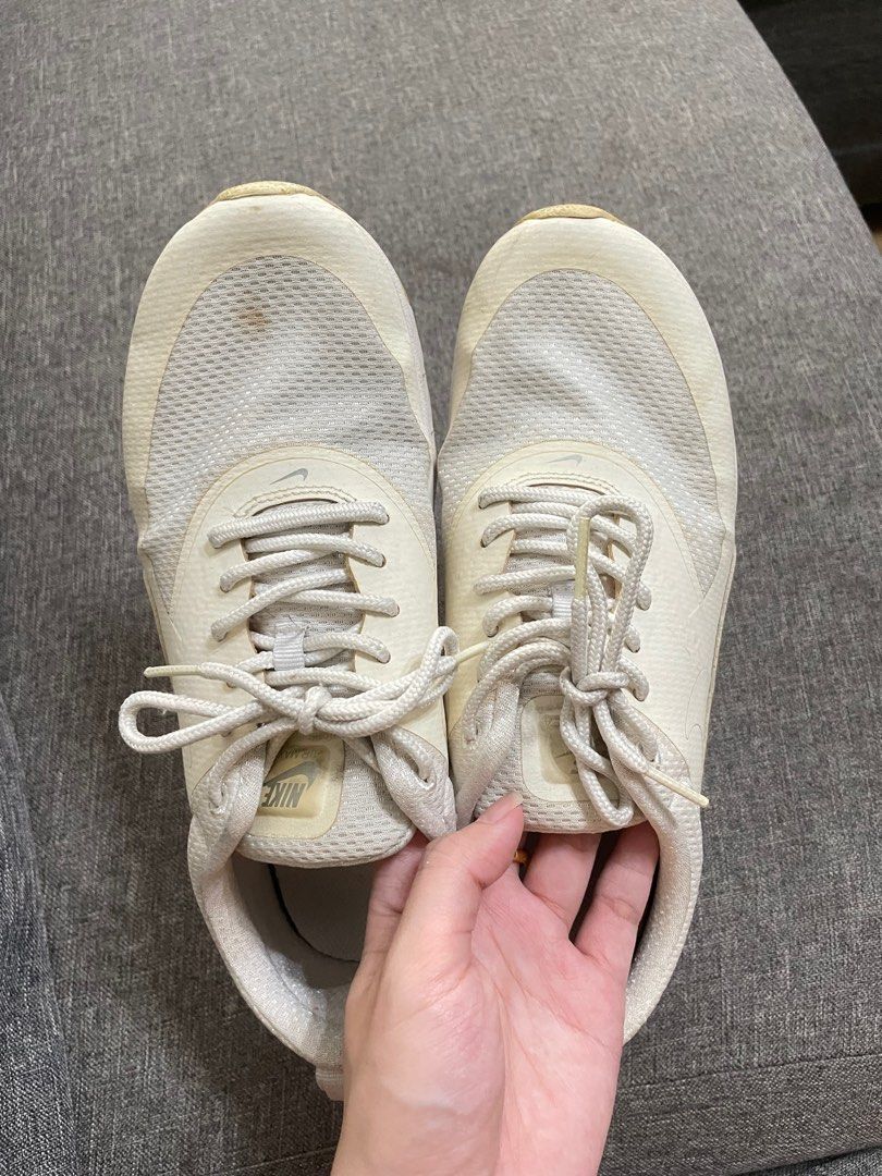 Nike Women White Sneakers (Category: Sneakers) located in Manila. Submitted by preloved0805 (Listing ID 1314656354, Image 2). Description: Bought in kids section. Can fit size 6-6.5, 24cm Flaw: has became yellowish after storage.