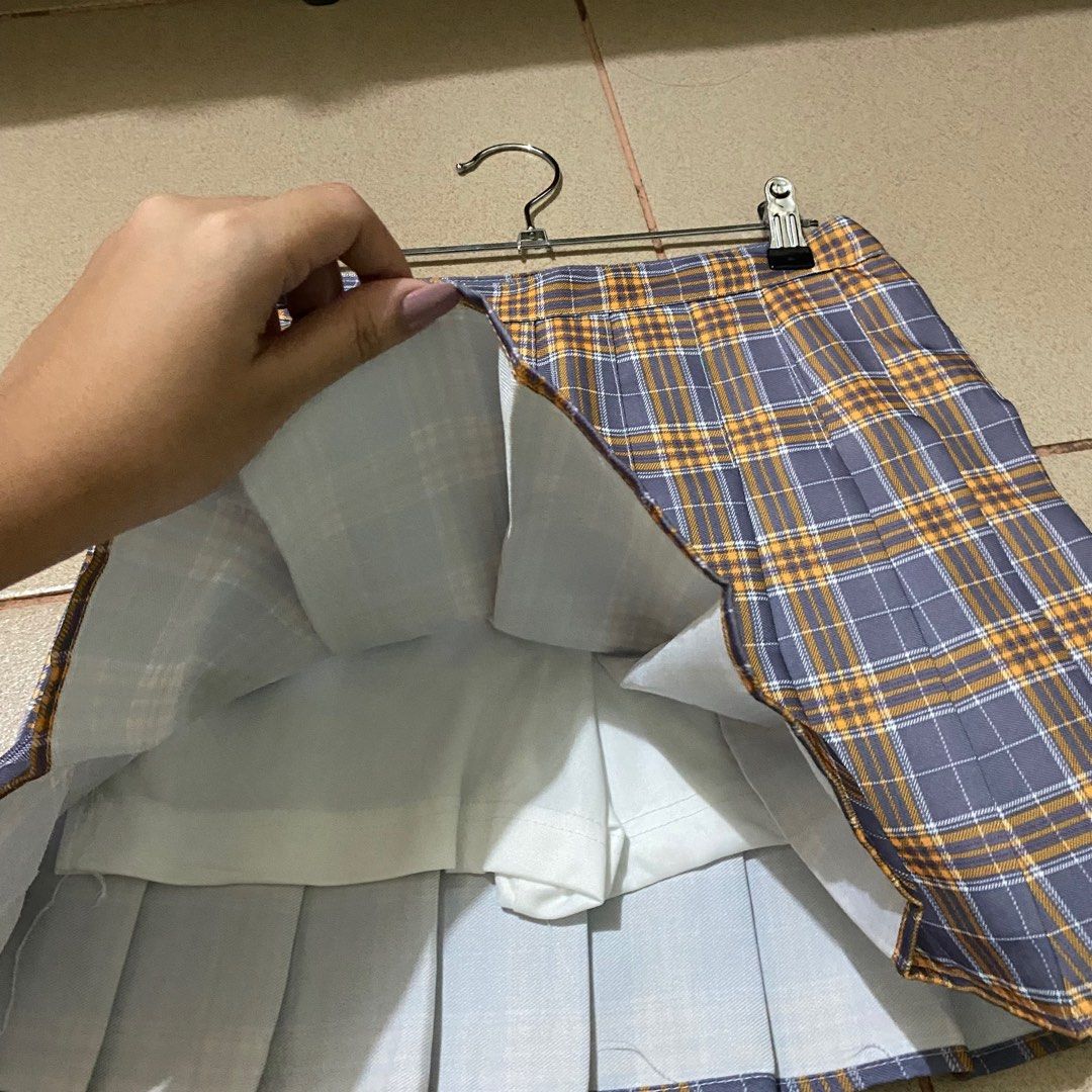 Plaid Skirt (Category: Skirts) located in San Pedro. Submitted by ranze (Listing ID 1314577734, Image 3). Description: Plaid skirt orange and purple Waist 28 Length 15.