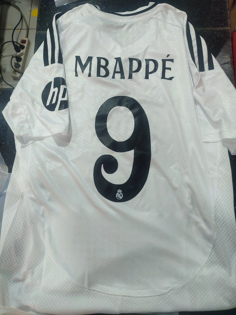 Real Madrid home fans issue 24/25 jersey+ custom name (Category: Activewear) located in Singapore. Submitted by hoodiepl (Listing ID 1314733363, Image 1). Description: brand new size S M L XL avail item be sending using tracking mail takes 1-3 working days no meet up no self-collect.