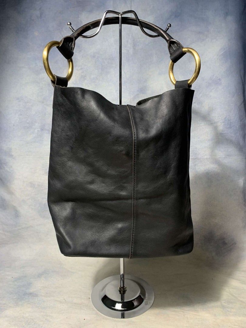 Sequioa Bucket bag Large Size (Category: Luxury Bags & Wallets) located in Santa Barbara. Submitted by ragrepository (Listing ID 1314679989, Image 2). Description: Sequioa Large size Length 12" Width 15" Depth 13" Strap Drop 6" Hang tag still intact No inclusions just bag inself Flaw: Press marks due to storage.