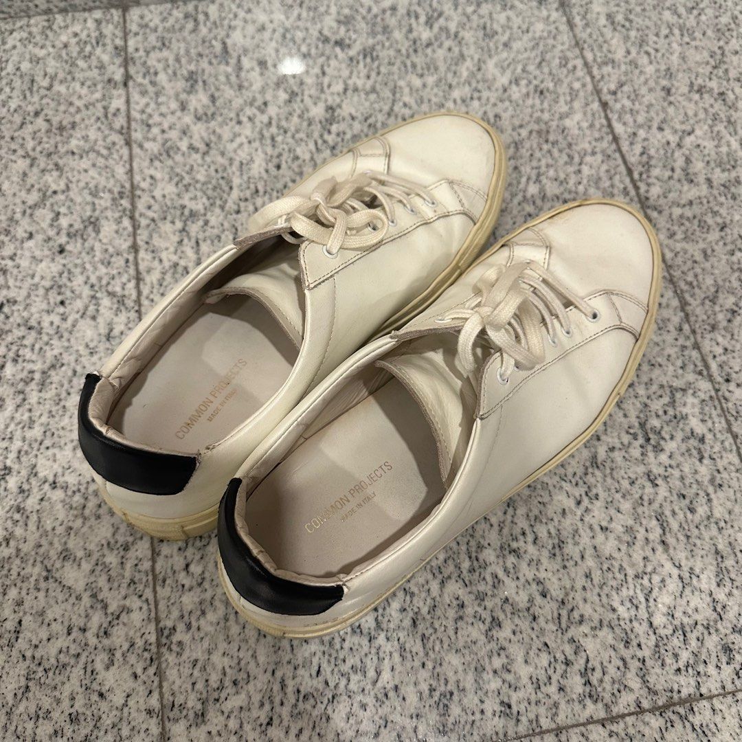Common project (Category: Sneakers & Footwear) located in Singapore. Submitted by foxay (Listing ID 1314864591, Image 2). Description: Condition as shown in pictures Slight tear at the back of the shoes Wording on left side has faded .