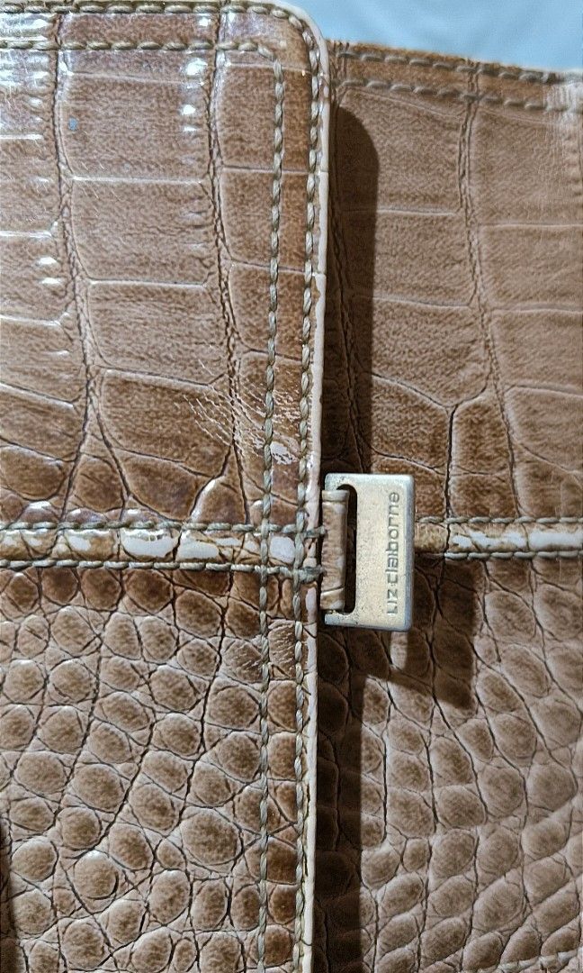 Liz Claiborne Croc Embossed Tri-Fold Wallet (Category: Luxury Bags & Wallets) located in Cabuyao City. Submitted by cookietherapyph (Listing ID 1314929773, Image 3). Description: No major flaws, still functions as it should Issues: Stains inside and the coin compartment zipper (can still close zipper, just needs something attached to it to easily open/close) RFS: Decluttering MOP: Gcash SHIPPING: J&T or Gogoxpress.