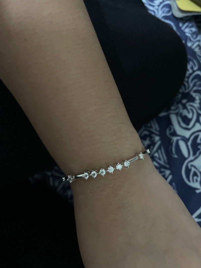 PRICE DOWN‼️ Moissanite Thin Bangle (Category: Bracelets) located in Laoag. Submitted by ravmi (Listing ID 1314832139, Image 2). Description: 17cm thin vermeil bangle with moissanite stones. All stones are positive with diamond tester. 9.25 hardness and almost the same spark as diamonds. Rfs: barely using it..
