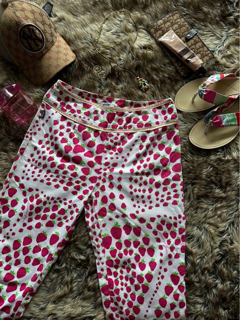 MOSCHINO STRAWBERRY print Y2K rare kid core (Category: Jeans) located in Quezon City. Submitted by toni.jade (Listing ID 1314769331, Image 1). Description: 3/4 rare donna moschino strawberry print jeans issue: dot stain 28-30 negotiable sf by buyer .