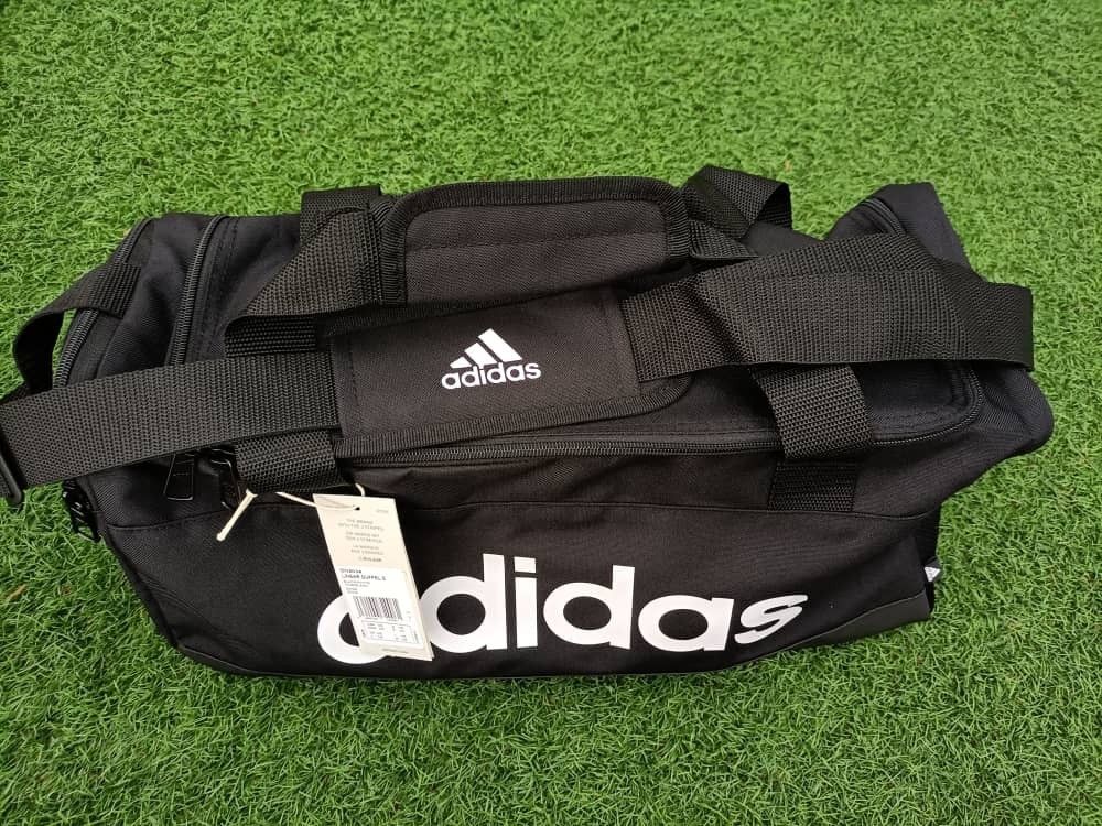 New xs S M size authentic Adidas essential logo duffel Bag. School Bag gym Bag Sports Bag outdoor activities Bag. Badminton basketball volleyball golf Bag badminton bag. Men s Fashion Bags Sling Bags
