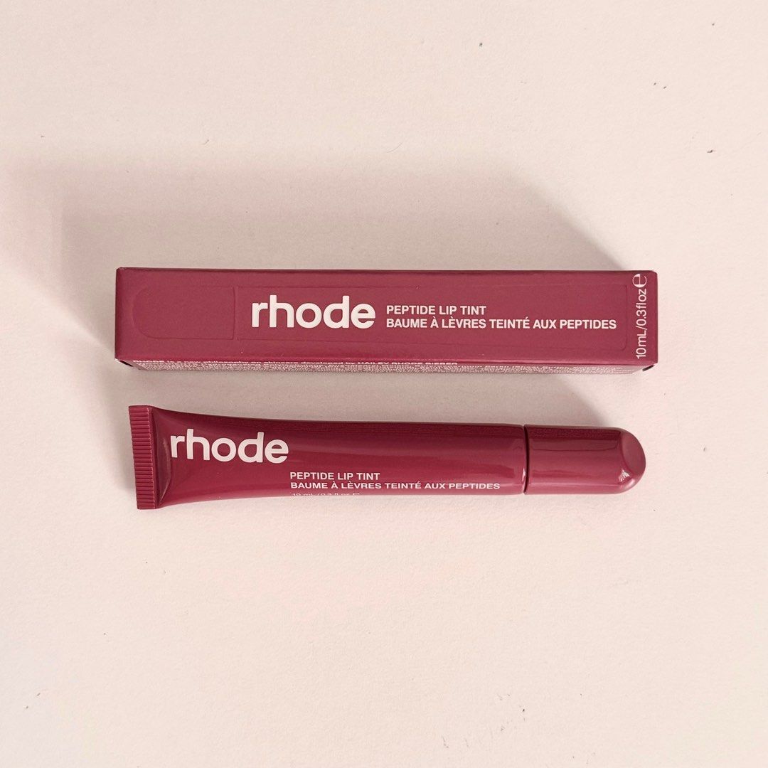 On-hand Rhode Lip Tint Raspberry Jelly (Category: Makeup) located in Pasig City. Submitted by thereseubk (Listing ID 1314787752, Image 1). Description: Rhode Lip Tint in Raspberry Jelly 🍇 Love this shade! Perfect for morena skin tones Brand new from the US! Also available: Ribbon lip tint, 14 Pro and 15 Pro lip case 🤳🏼.