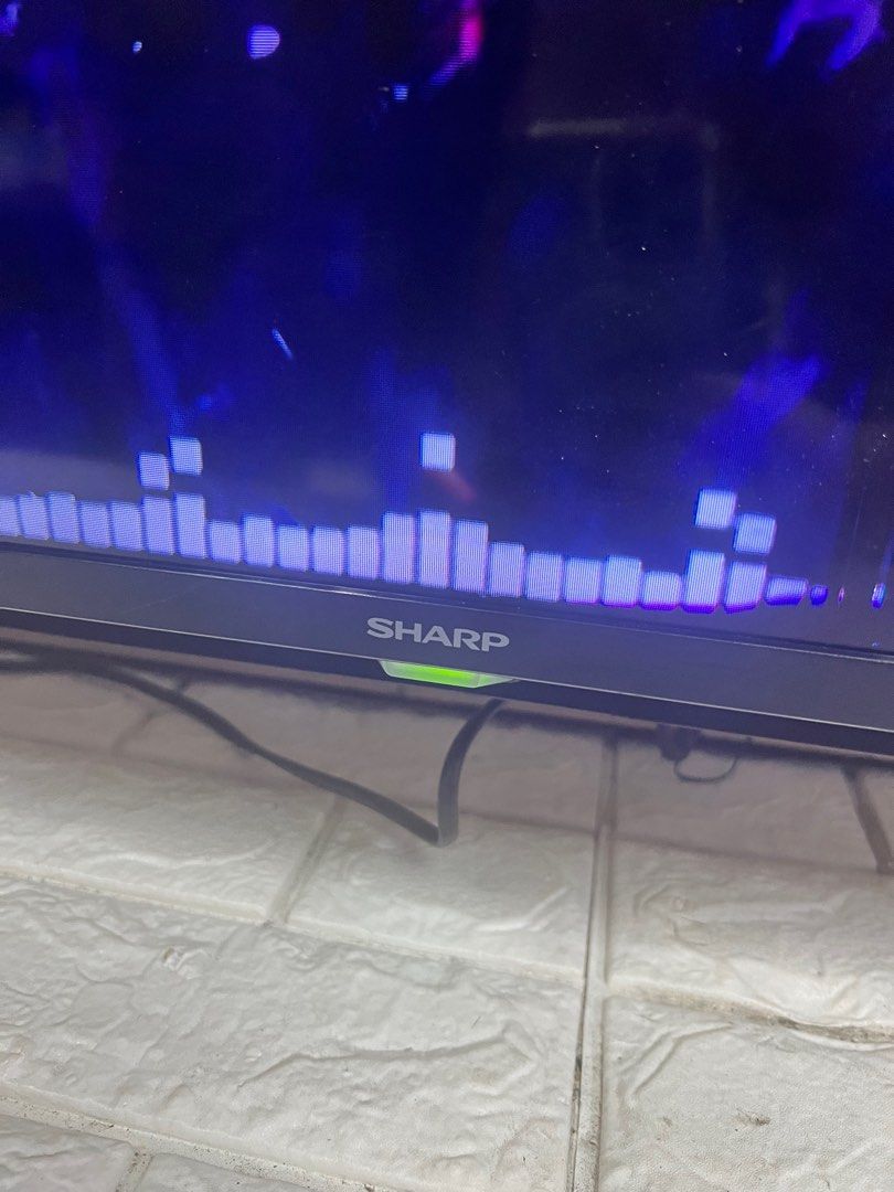 Sharp Aquos 42” with remote Smart TV with issue (Category: TV) located in Pasay City. Submitted by meostore (Listing ID 1314795360, Image 3). Description: with issue vertical line 220v ready to use smart tv na po 42” with remote bawal sa maselan dolby audio.