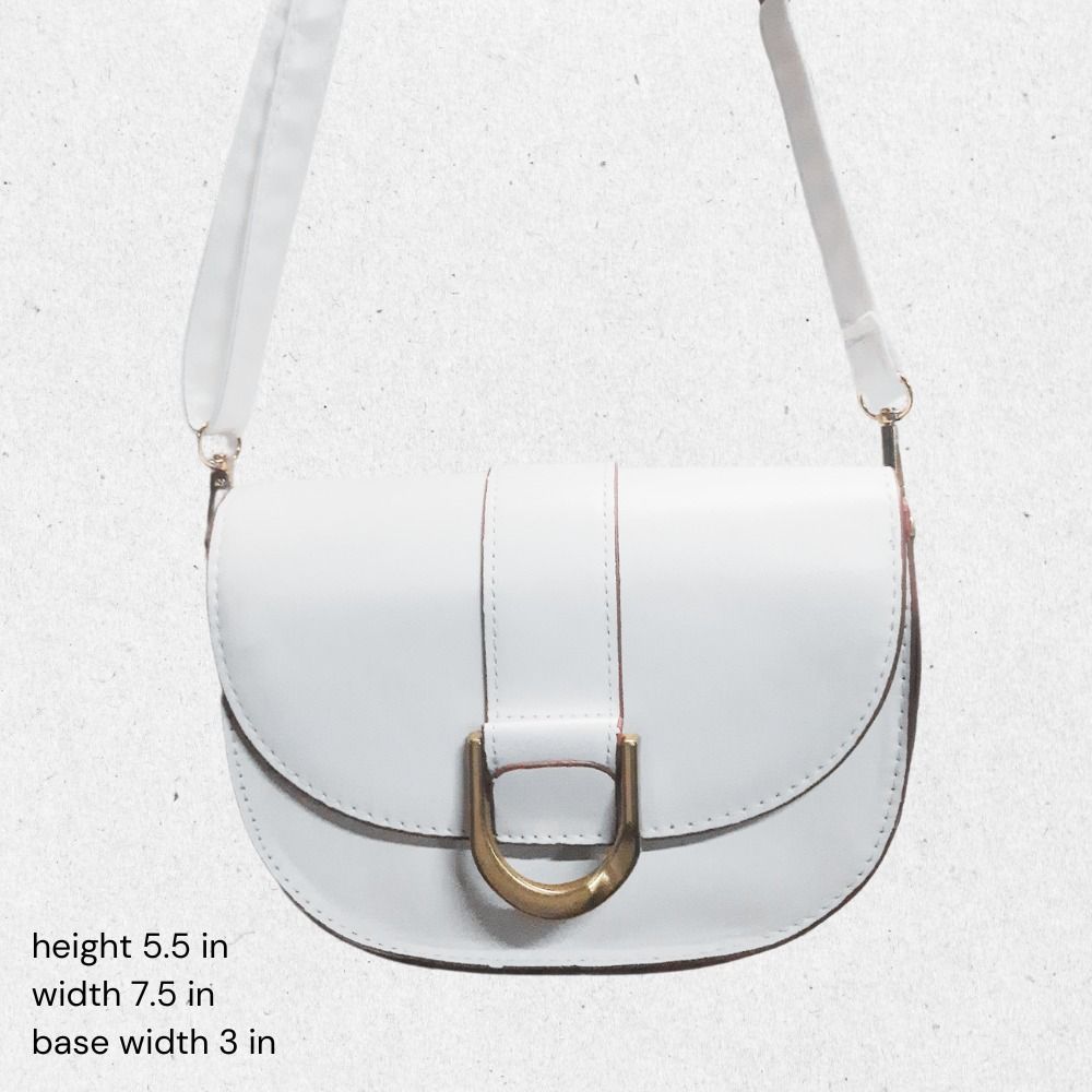 White half moon bag / purse / clutch (Category: Purses & Pouches) located in Caloocan City. Submitted by preloved.decluttering (Listing ID 1314851218, Image 1). Description: White half moon bag With removable straps so it can act as a clutch The straps are also adjustable in length so it can be a mini shoulder bag or a sling bag Used once.