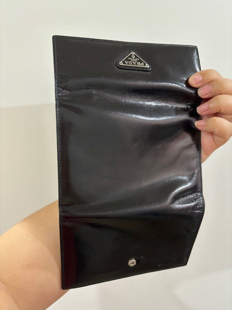 Black Prada Trifold Wallet (Category: Luxury Bags & Wallets) located in Bacoor. Submitted by shop.cza (Listing ID 1315074953, Image 2). Description: No box 6 card slot 1 coin pouch.