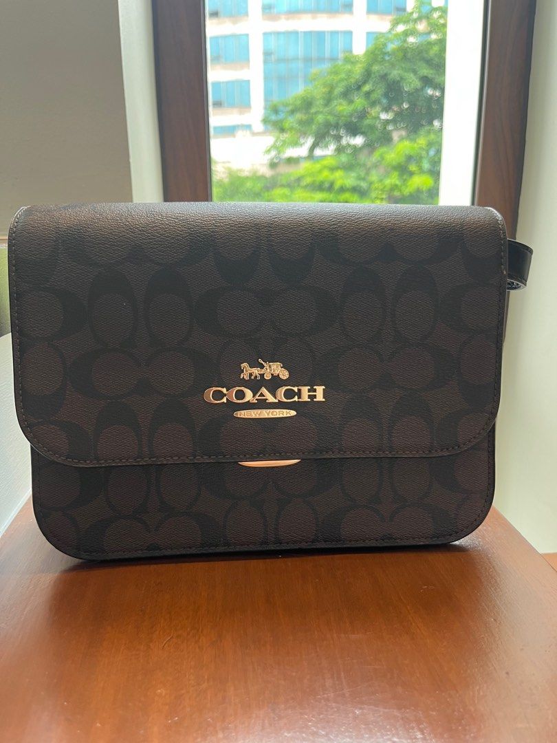 Coach Sling Bag (Category: Luxury Bags & Wallets) located in Manila. Submitted by lauren.tan. (Listing ID 1315001202, Image 1). Description: 100% Authentic Slightly Used Good as New.