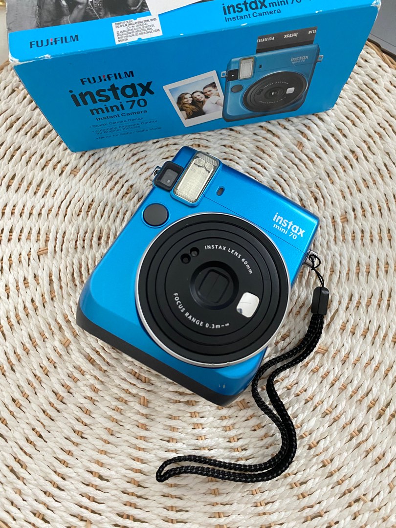 A Mount Fujifilm Instax Mini 12 Blue EX D Digital Camera, Model Name