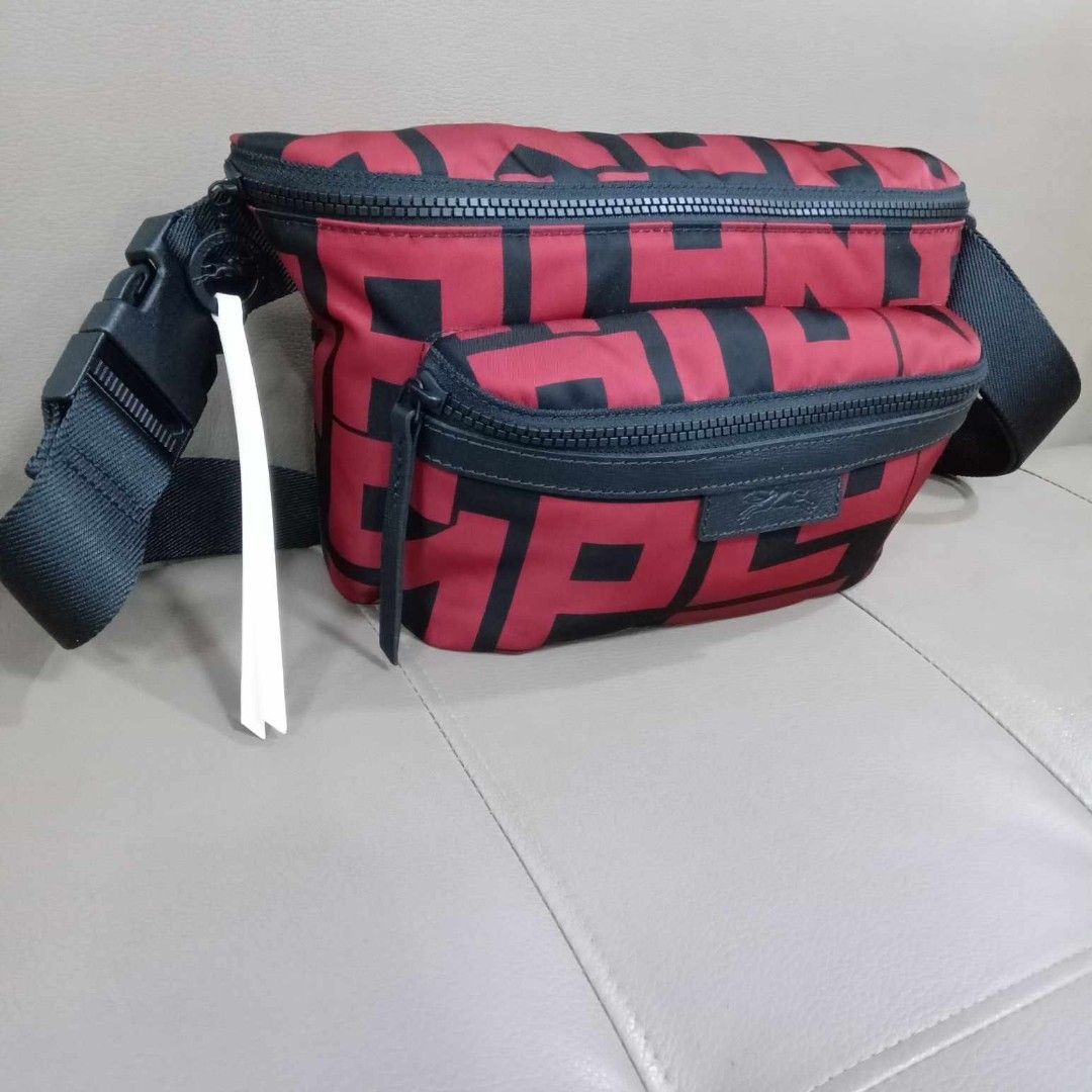 Longchamp Body/Belt Bag Red/Black (Category: Luxury Bags & Wallets) located in Taguig. Submitted by esa.agustin (Listing ID 1315018465, Image 2). Description: Original Longchamp medium size nylon body/beltbag in red and black color combination. With carecard..