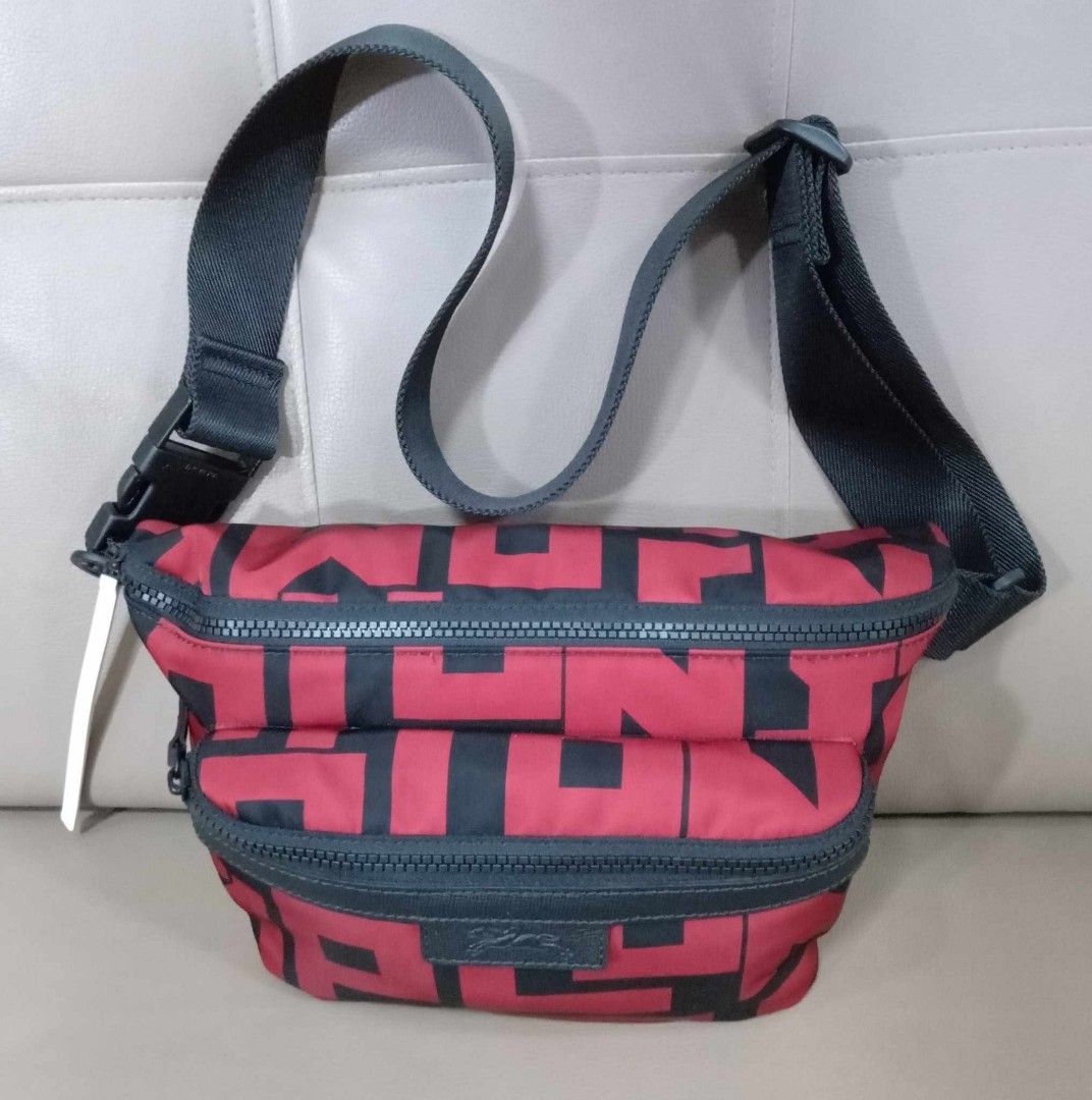 Longchamp Body/Belt Bag Red/Black (Category: Luxury Bags & Wallets) located in Taguig. Submitted by esa.agustin (Listing ID 1315018465, Image 3). Description: Original Longchamp medium size nylon body/beltbag in red and black color combination. With carecard..