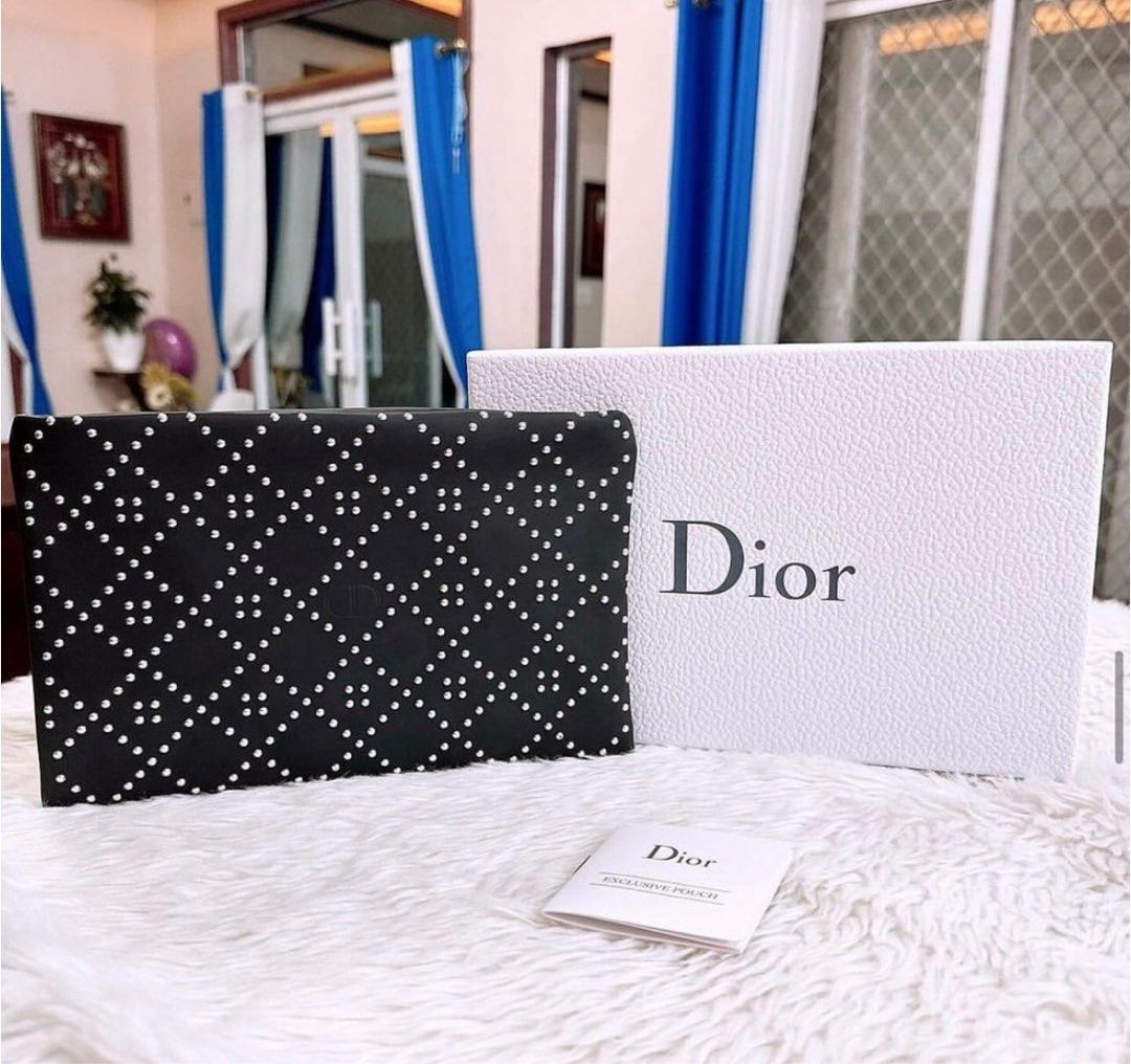 Dior beauty pouch wallet (Category: Luxury Bags & Wallets) located in Cainta. Submitted by adriannee (Listing ID 1315143677, Image 3). Description: Authentic gift with purchase from Dior - Comes with hard box only Can be gifted - Size 10 inches L x 6.5 inches Can fit your phone and powerbank and then some more stuff.