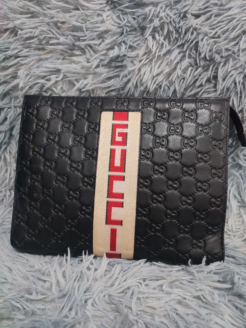 Gucci man clutch online