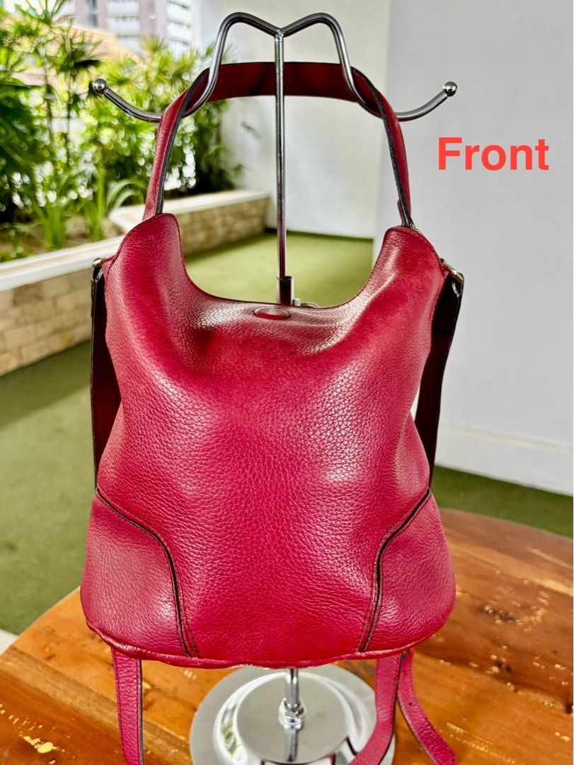 Massimo Dutti two-way bucket bag in maroon (Category: Cross-body Bags) located in Pasig City. Submitted by lexans_bentables (Listing ID 1315221698, Image 2). Description: Authentic Massimo Dutti two-way bucket bag in maroon ❣️ CLEARANCE SALE ❣️ - made of soft and slouchy real leather - made in Spain - magnetic closure - can be used as handbag or crossbody bag - clean suede lining, no foul smell - hardware still shiny - no rubs, no cracks, no peel