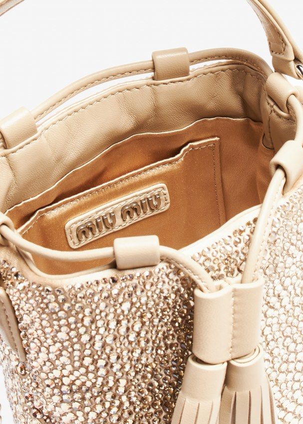 MIU MIU CRYSTAL SLING BAG SHOULDER BAG (Category: Luxury Bags & Wallets) located in Tagaytay City. Submitted by verycutesy8 (Listing ID 1315225203, Image 2). Description: Miu Miu Crystal Bag SUPER RARE FIND! Very pretty in person, the sling is missing so selling for low. Inclusion dustbag only. I got this for 35k No returns, No exchange, No refunds..