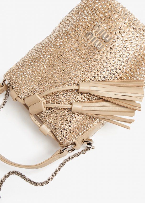 MIU MIU CRYSTAL SLING BAG SHOULDER BAG (Category: Luxury Bags & Wallets) located in Tagaytay City. Submitted by verycutesy8 (Listing ID 1315225203, Image 3). Description: Miu Miu Crystal Bag SUPER RARE FIND! Very pretty in person, the sling is missing so selling for low. Inclusion dustbag only. I got this for 35k No returns, No exchange, No refunds..