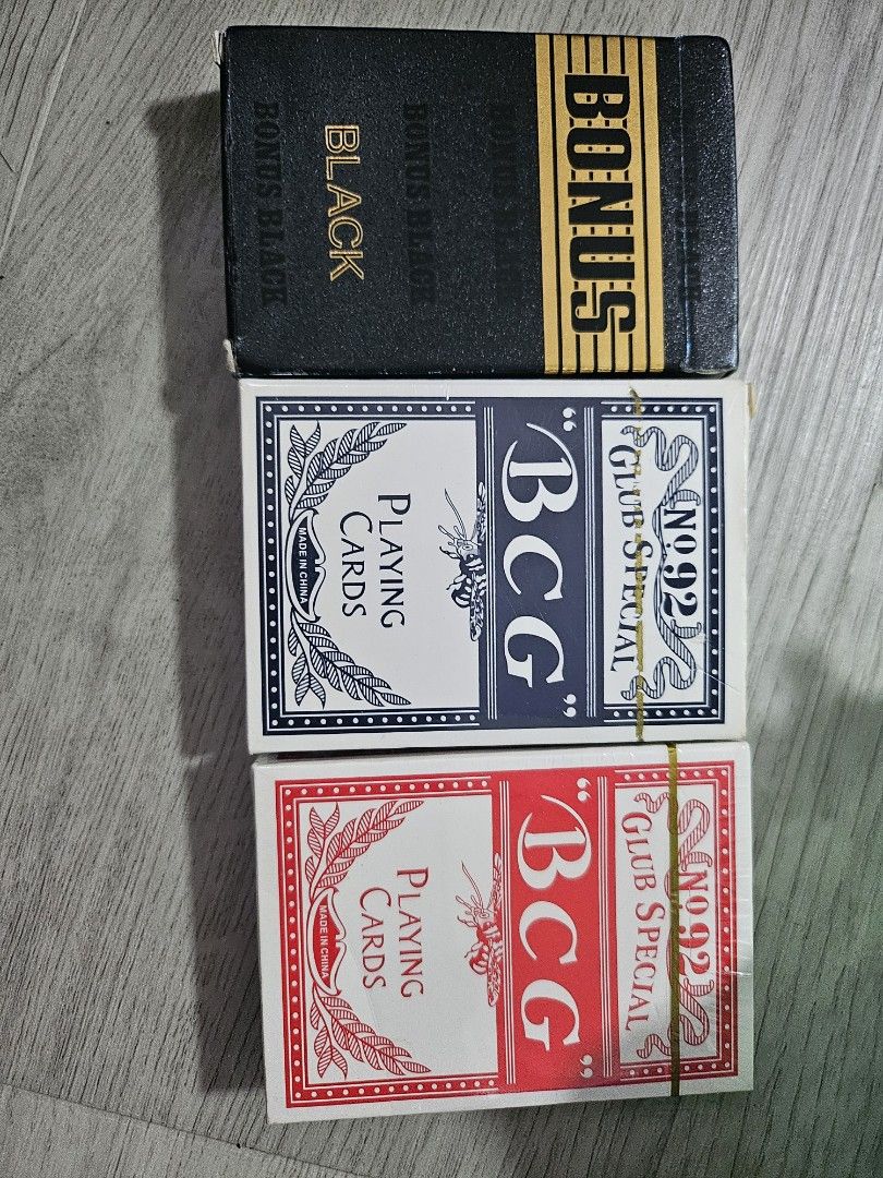 Playing cards (Category: Board Games & Puzzles) located in Singapore. Submitted by ching_0513 (Listing ID 1315190607, Image 1). Description: red box- 5$ new, not opened yet blue box- 4$ black box - 3$ take all -10$.
