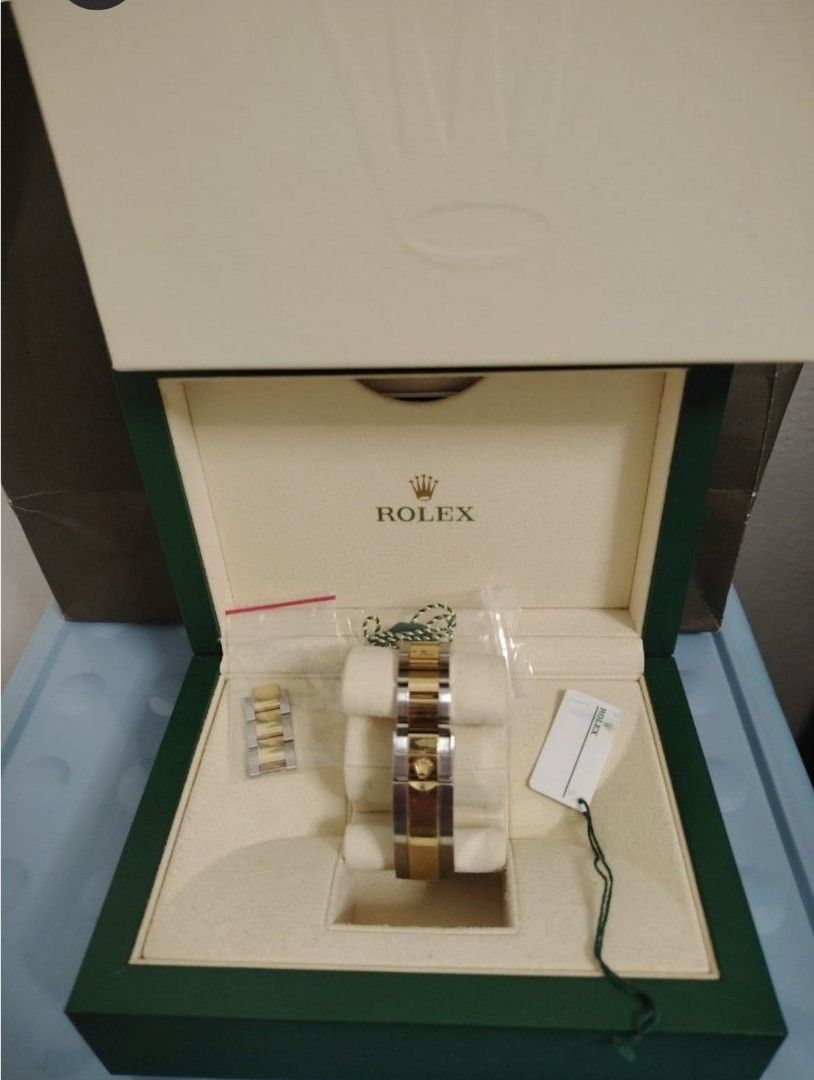 Rolex half gold submariner moving out sales
