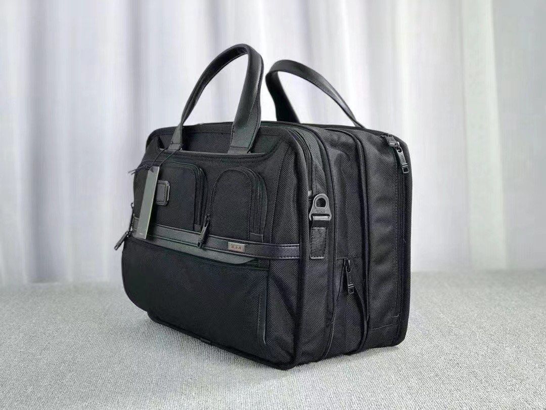 Tumi Alpha 3 Expandable Oraganizer Laptop Brief (Category: Briefcases) located in Manila. Submitted by bagmaniaph (Listing ID 1315132673, Image 3). Description: Embossed leather top carry handles Detachable adjustable padded shoulder strap Detachable luggage tag Zip closure, zip expansion Three front zip pockets, key leash Front slit pocket with concealed magnetic snap closure Back zip pocket with add-a-bag sleeve, back slit pocket Removable padd