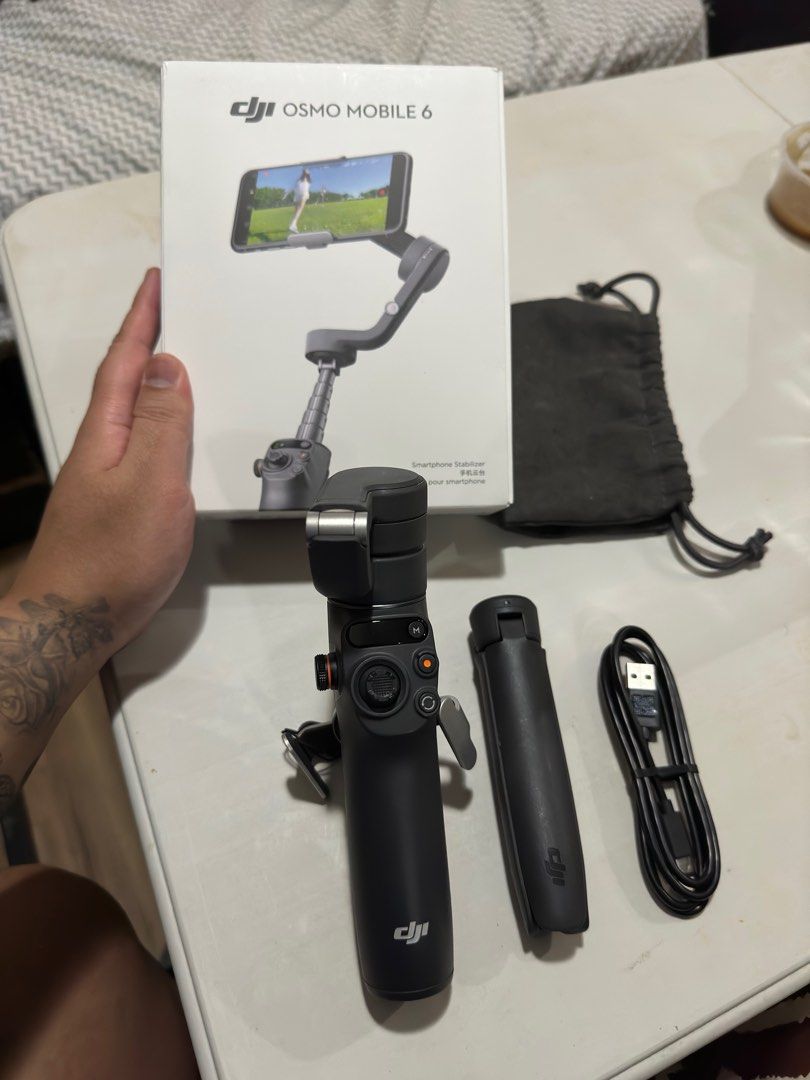 DJI osmo mobile 6 - Complete used only once (Category: Cameras) located in Makati City. Submitted by declutter_master (Listing ID 1311922258, Image 2). Description: used only once for our Hongkong trip. like new. Original price is 7995 for the mall Conplete Package .