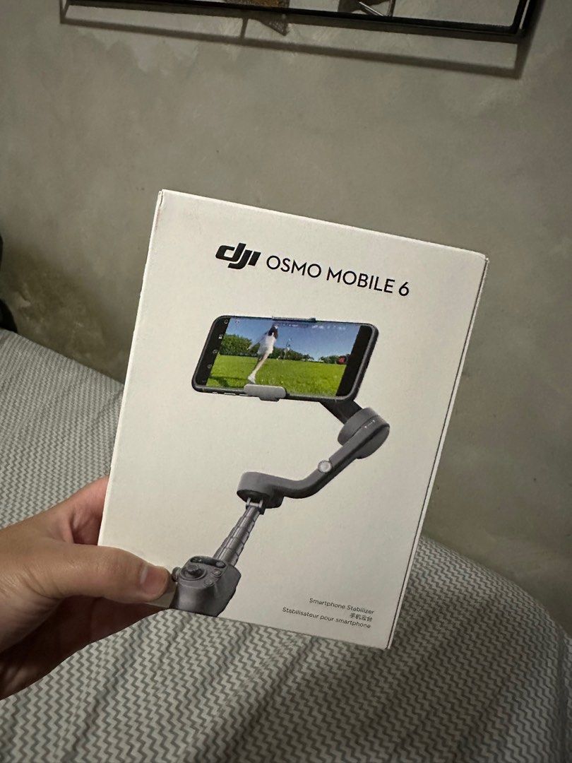DJI osmo mobile 6 - Complete used only once (Category: Cameras) located in Makati City. Submitted by declutter_master (Listing ID 1311922258, Image 1). Description: used only once for our Hongkong trip. like new. Original price is 7995 for the mall Conplete Package .