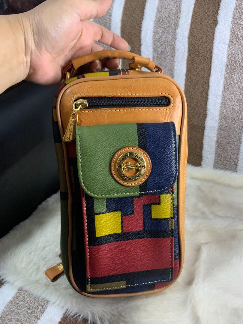 Double fish milano leather clutch (Category: Luxury Bags & Wallets) located in Cabanatuan. Submitted by mjluxxejapan (Listing ID 1312079033, Image 1). Description: NO LP PLS.all details posted.like new.gandaa nto.genuine leather Approx 10”6”.kapal ng leather matibay .