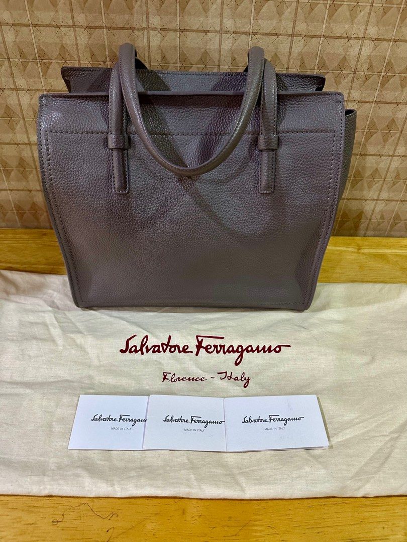 Ferragamo Shoulder bag (Category: Luxury Bags & Wallets) located in Manila. Submitted by stylishgal (Listing ID 1311941251, Image 2). Description: Rarely used, Good as new Authentic Ferragamo bag with dustbag An elegant Salvatore Ferragamo handbag in leather. Zip front pocket and zip top. Double handles. Roomy leather interior with zip pocket. Material Exterior: Calfskin Leather Interior: Calfskin Leather.