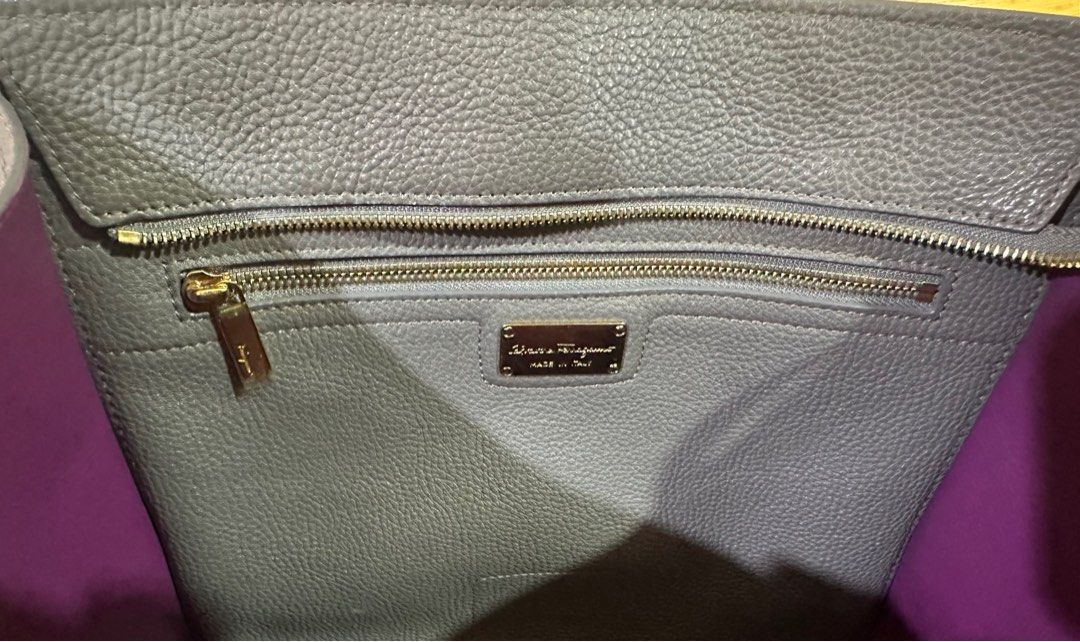 Ferragamo Shoulder bag (Category: Luxury Bags & Wallets) located in Manila. Submitted by stylishgal (Listing ID 1311941251, Image 3). Description: Rarely used, Good as new Authentic Ferragamo bag with dustbag An elegant Salvatore Ferragamo handbag in leather. Zip front pocket and zip top. Double handles. Roomy leather interior with zip pocket. Material Exterior: Calfskin Leather Interior: Calfskin Leather.