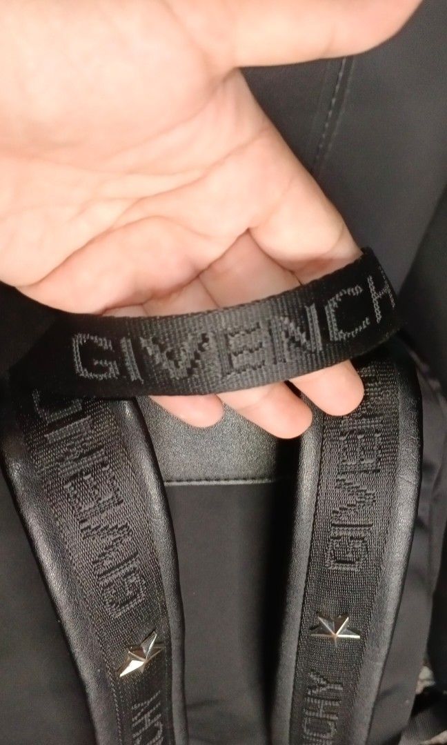 GIVENCHY star backpack (Category: Backpacks) located in Legazpi City. Submitted by georgepineda791 (Listing ID 1311913070, Image 3). Description: Durable Nylon Canvas. Features Givenchy underzip with code. Very minimal signs of usage on the pullers. Flaw to note: The front lower leather part shows deterioration/peeling due to age and long storage. This is already visible and should be considered before purchasing..