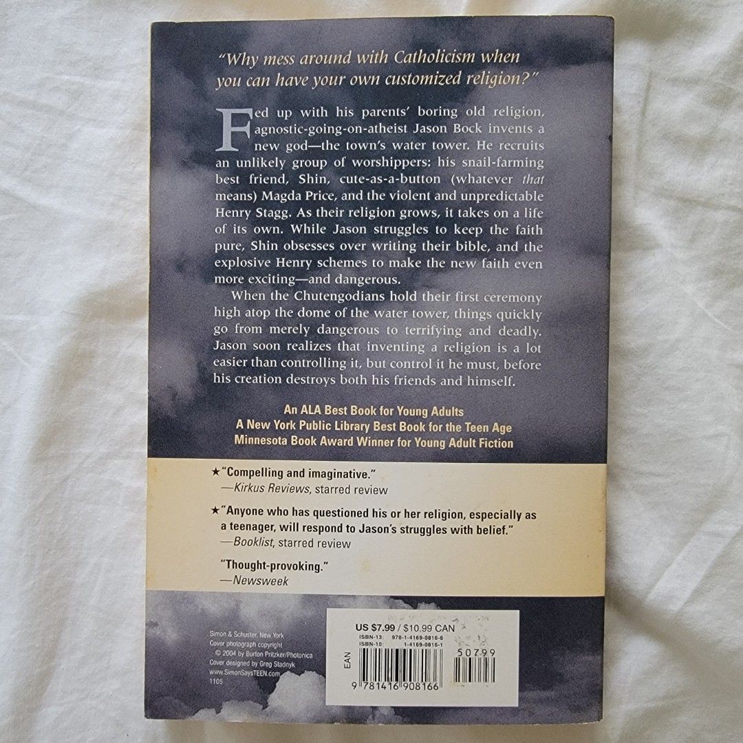 Novel - Godless by Pete Hautman (Category: Storybooks) located in Manila. Submitted by kvlwrites (Listing ID 1311971741, Image 2). Description: Title: Godless Author: Pete Hautman Genre: Fiction Original Price: ₱499 Selling for: ₱100 RFS: Decluttering " "Why mess around with Catholicism when you can have your own customized religion?" Fed up with his parents' boring old religion, agnostic-going-on-atheist Jason Bock invents a new god -- the town'