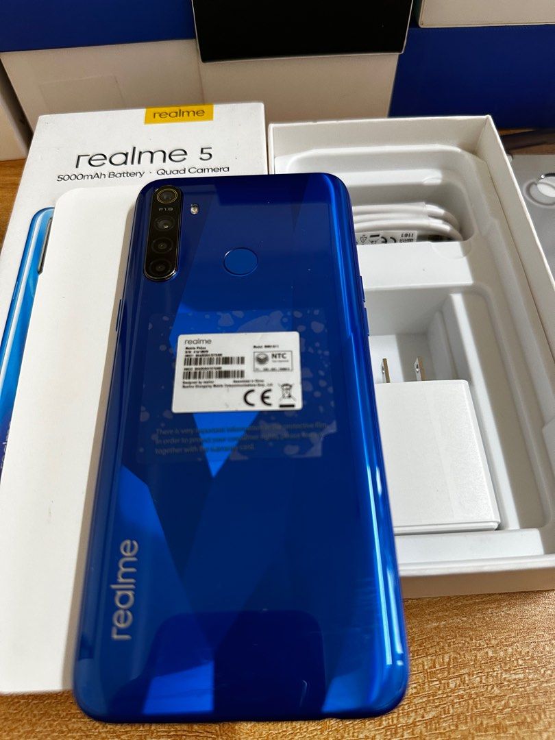 REALME 5 3GB + 64GB Crystal Blue (Category: Realme) located in Manila. Submitted by raziela.08 (Listing ID 1311978747, Image 2). Description: Please check all the actual photos are uploaded REALME 5 3GB + 64GB With Slight scratches like what is posted Complete Inclusion Never been used inclusion / Bago Check all you want upon pick up kaliwaan po tayo Color Crystal Blue PLEASE NO PRICE HAGGLING MASYADO MABABA NA PO PRICE LOCATION : QUIAPO MANILA P