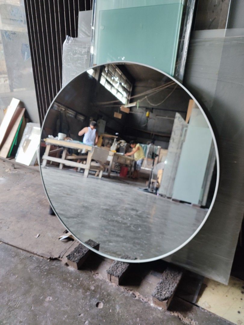 Round mirror with white aluminum frame (Category: Mirrors) located in Malabon City. Submitted by mirrors.ph (Listing ID 1311961376, Image 3). Description: Round mirror with white aluminum frame and plywood backing using 6mm thick copper free mirror Size: 100cm diameter P3307.50 Add P200 if with back hook Available in gold, glossy black, matte black, white and silver aluminum frame. Customize sizes and shapes are welcome.