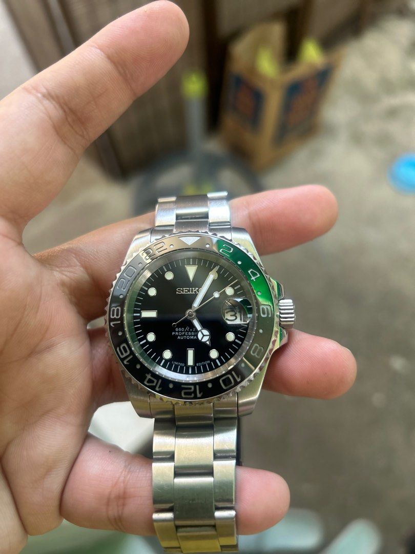 Seiko Mod submariner gmt design (Category: Luxury Watches) located in Las Pinas. Submitted by bbmono (Listing ID 1312092821, Image 3). Description: Seiko Mod Submariner Gmt design Nh35 automatic movement Well-used but in great condition. Only marks are on the bracelet and not on the watch itself. .