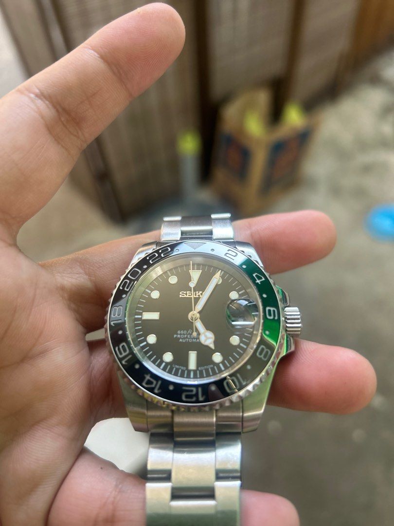 Seiko Mod submariner gmt design (Category: Luxury Watches) located in Las Pinas. Submitted by bbmono (Listing ID 1312092821, Image 2). Description: Seiko Mod Submariner Gmt design Nh35 automatic movement Well-used but in great condition. Only marks are on the bracelet and not on the watch itself. .