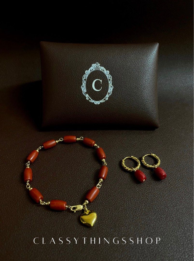 Authentic Red Coral Set with Heart Charm (Category: Bracelets) located in Quezon City. Submitted by classythingsshop (Listing ID 1315333990, Image 1). Description: Authentic Red Coral Set with Heart Charm (for Adults) A set of: - 1 Red Coral Bracelet (w/ Heart Charm) - 1 Red Coral Dangling Earrings Actual photo of the items. The item is customizable and can be made according to the client’s preferred length (price may vary depending on the length